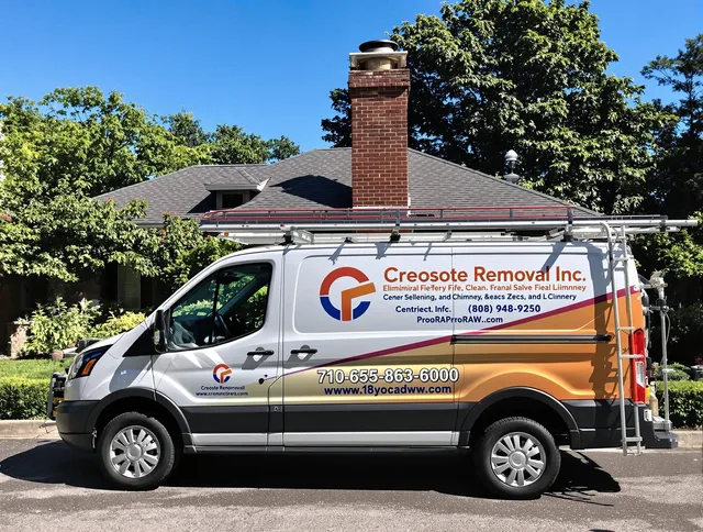 Pickerington Chimney Sweep technician removing creosote safely in Pickerington, OH