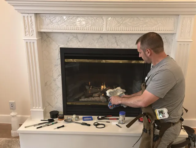 Pickerington Chimney Sweep performing fireplace maintenance in Pickerington, OH